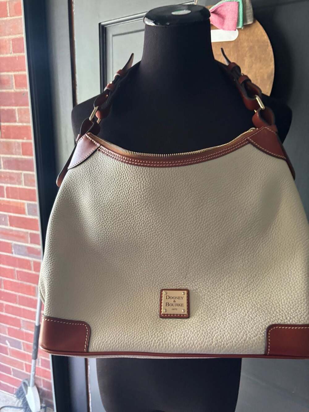 Dooney and Bourke White Leather Hobo Bag with Brown Trim,